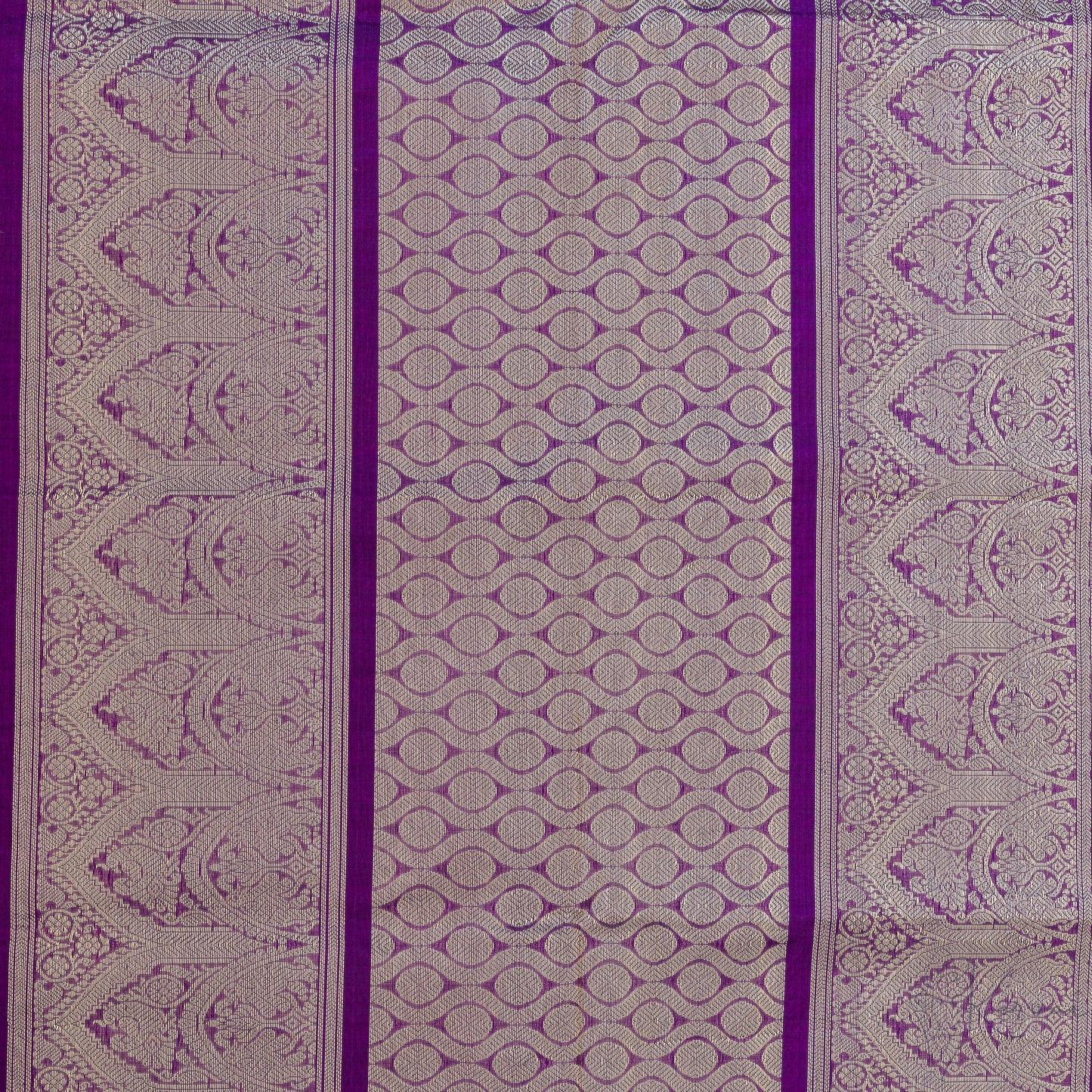 Closer view of violet pallu with intricate gold zari work.