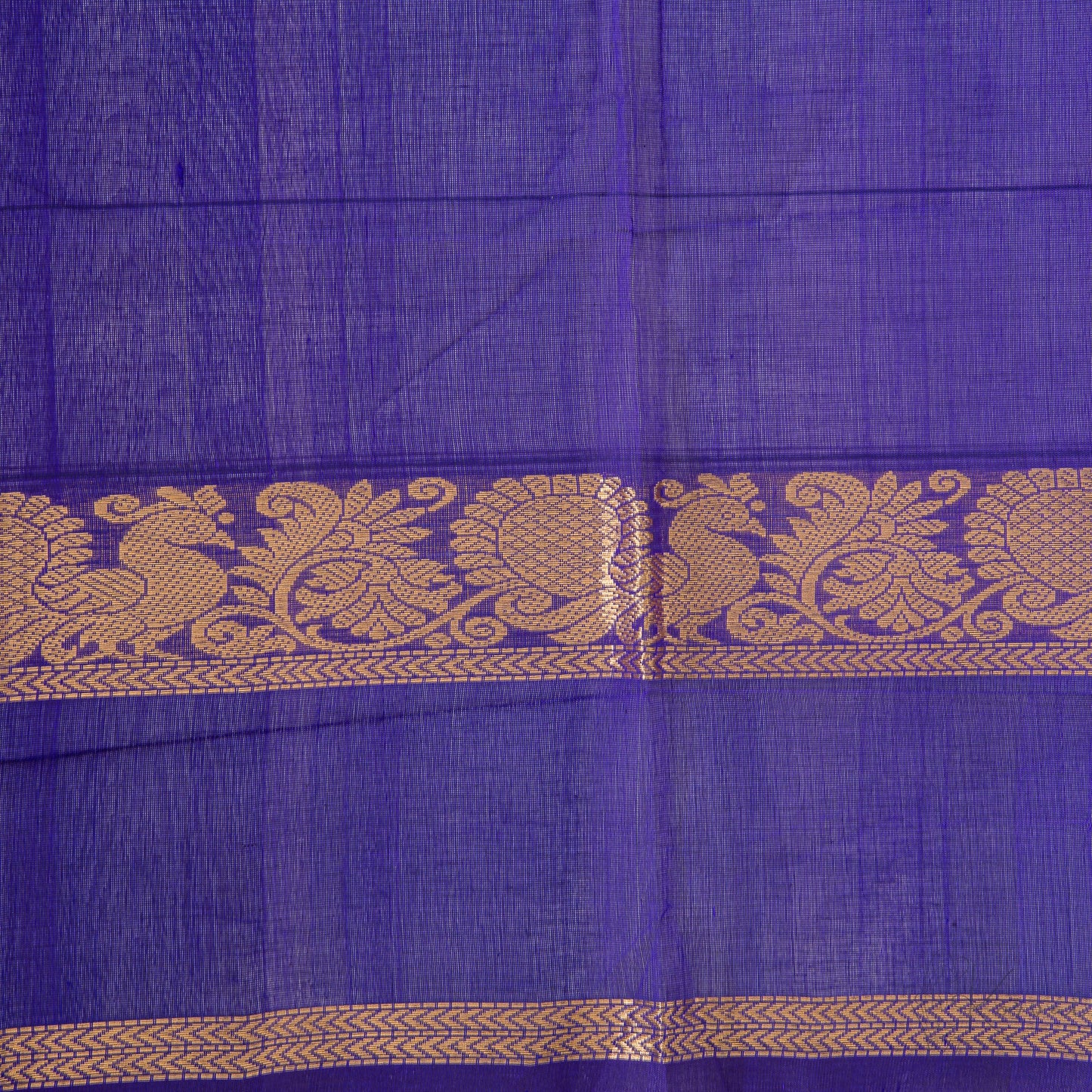 Closer view of blue coloured blouse fabric with Annam motifs in the border.