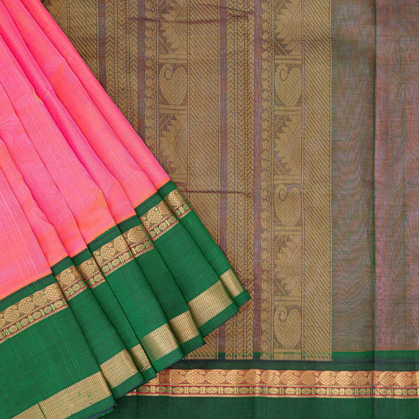 Pink silk cotton saree with closer view of lavender colour pallu with intricate zari designs.