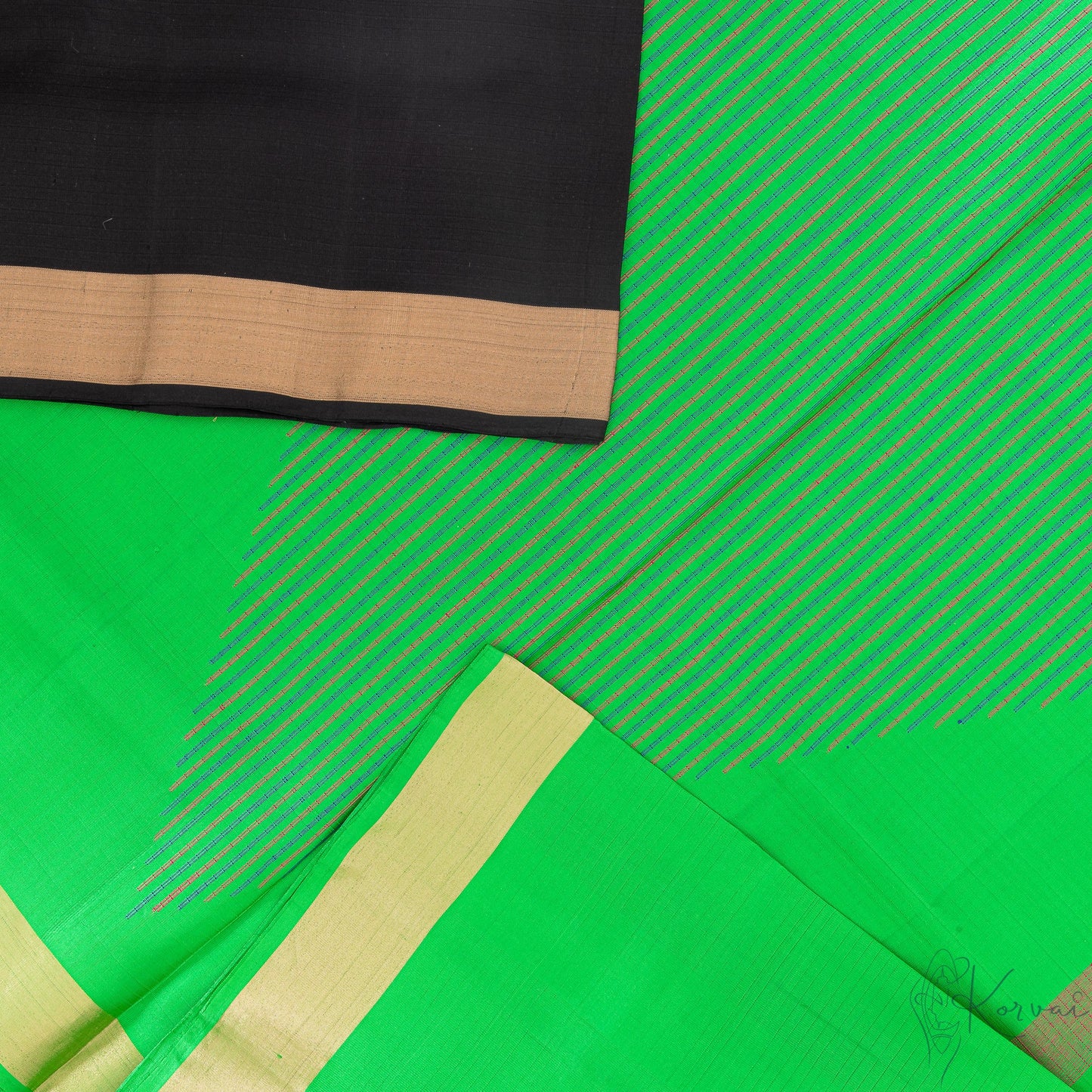 Top view of black soft silk saree with a closer view on parrot green pallu with multi colour diamond motif.