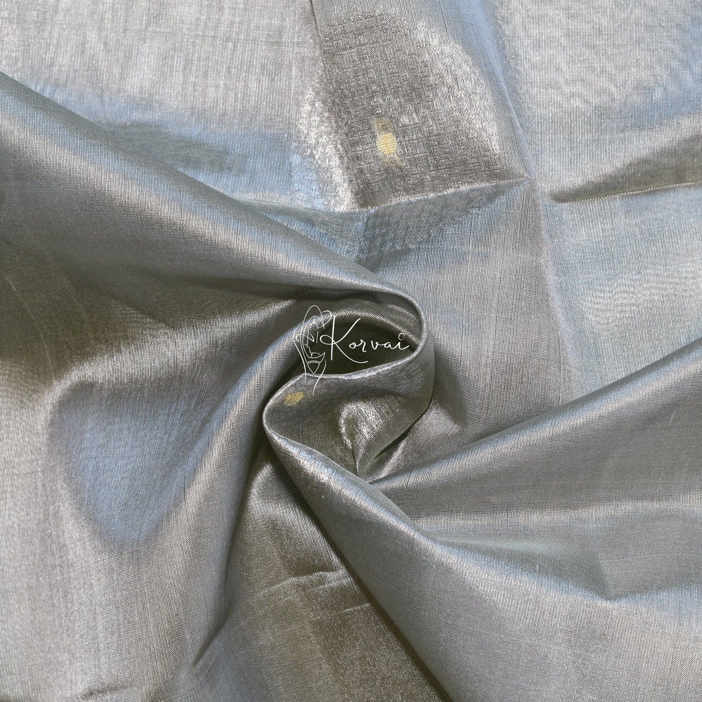 Closer view of the body with dotted circle motifs.