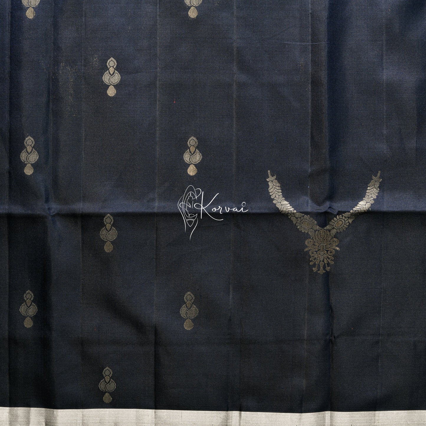 Closer view of the body with necklace and jhumka motifs.