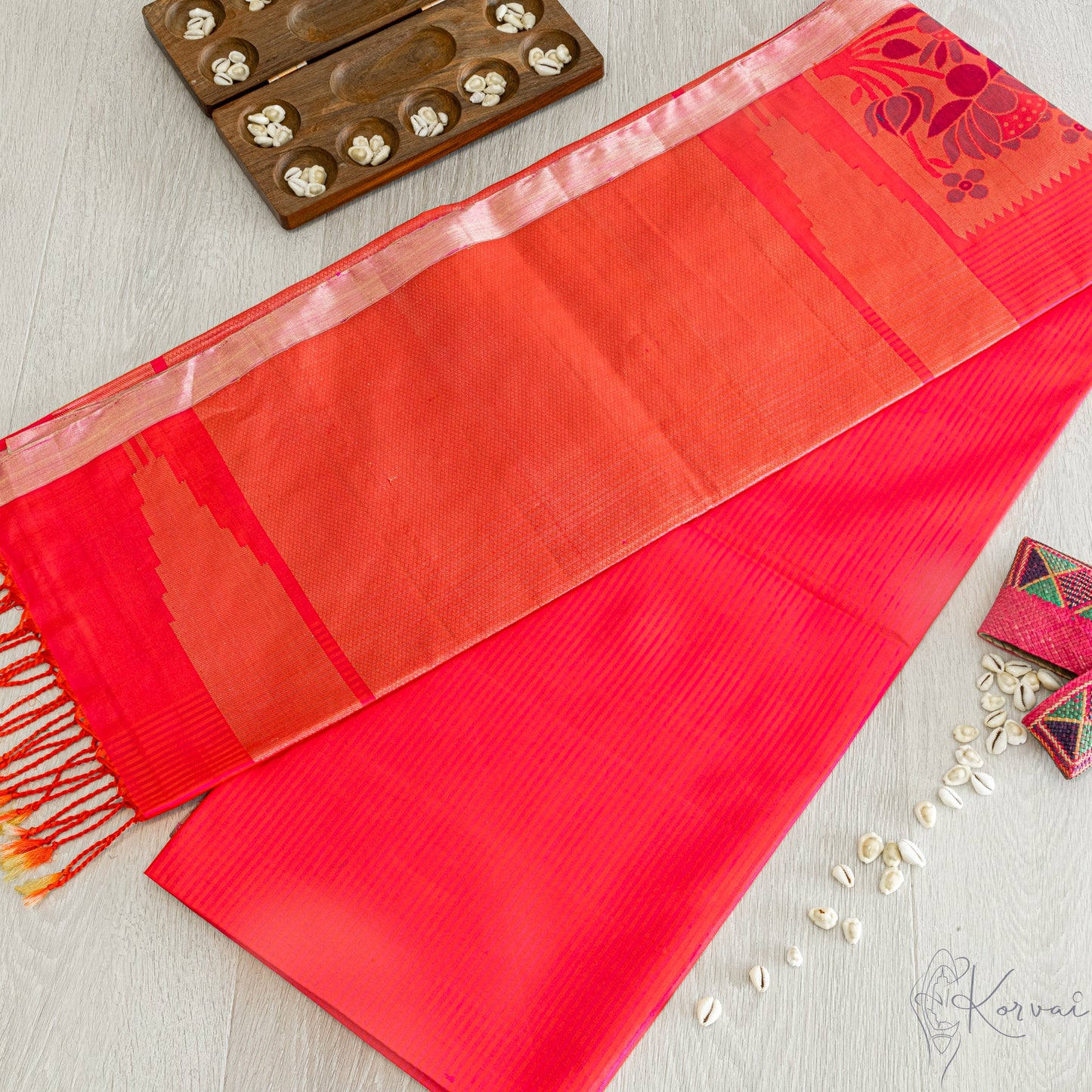 Hot pink colored Kanjivaram soft silk saree with light pink coloured horizontal stripes.