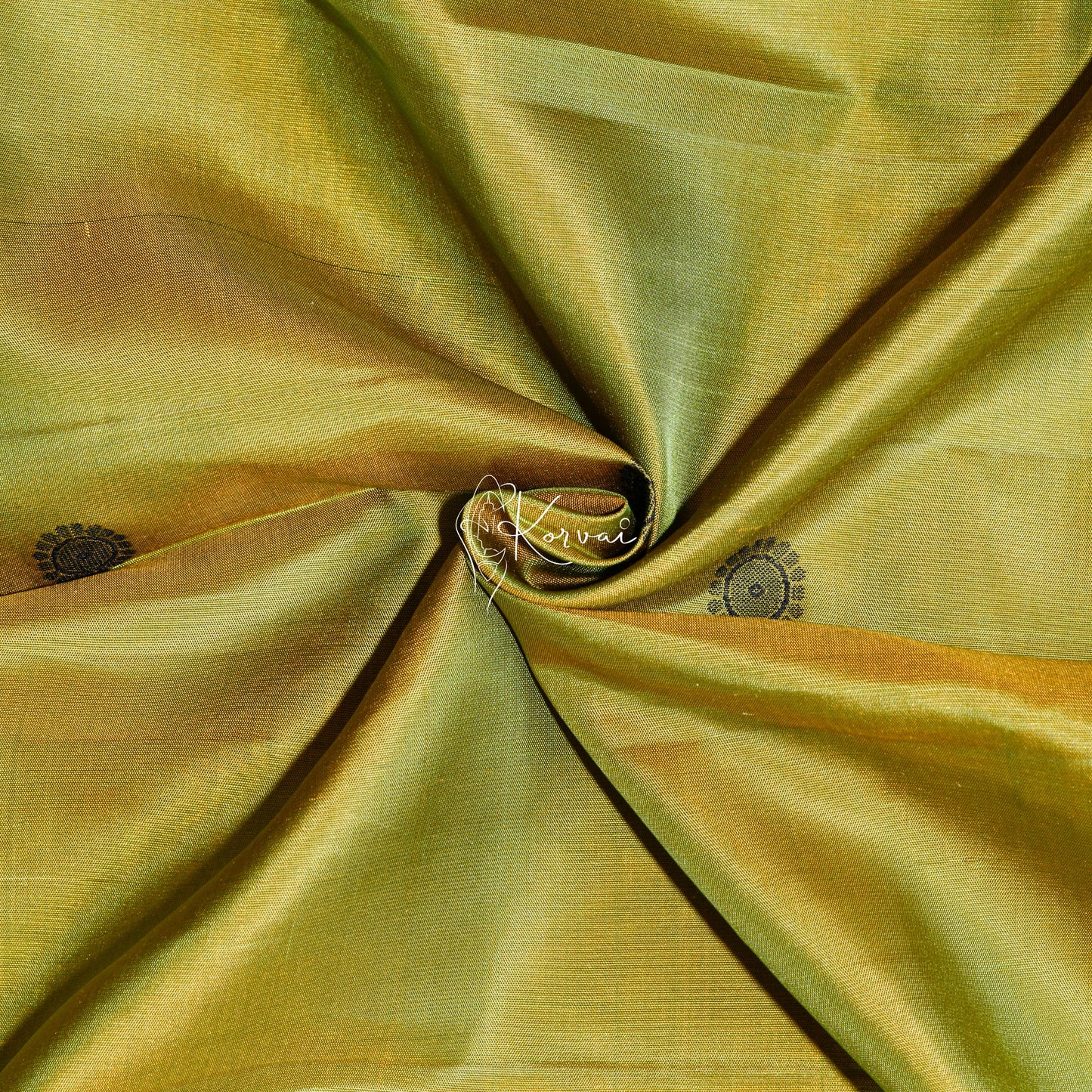 Closer view of the body with peacock and wheel motifs.