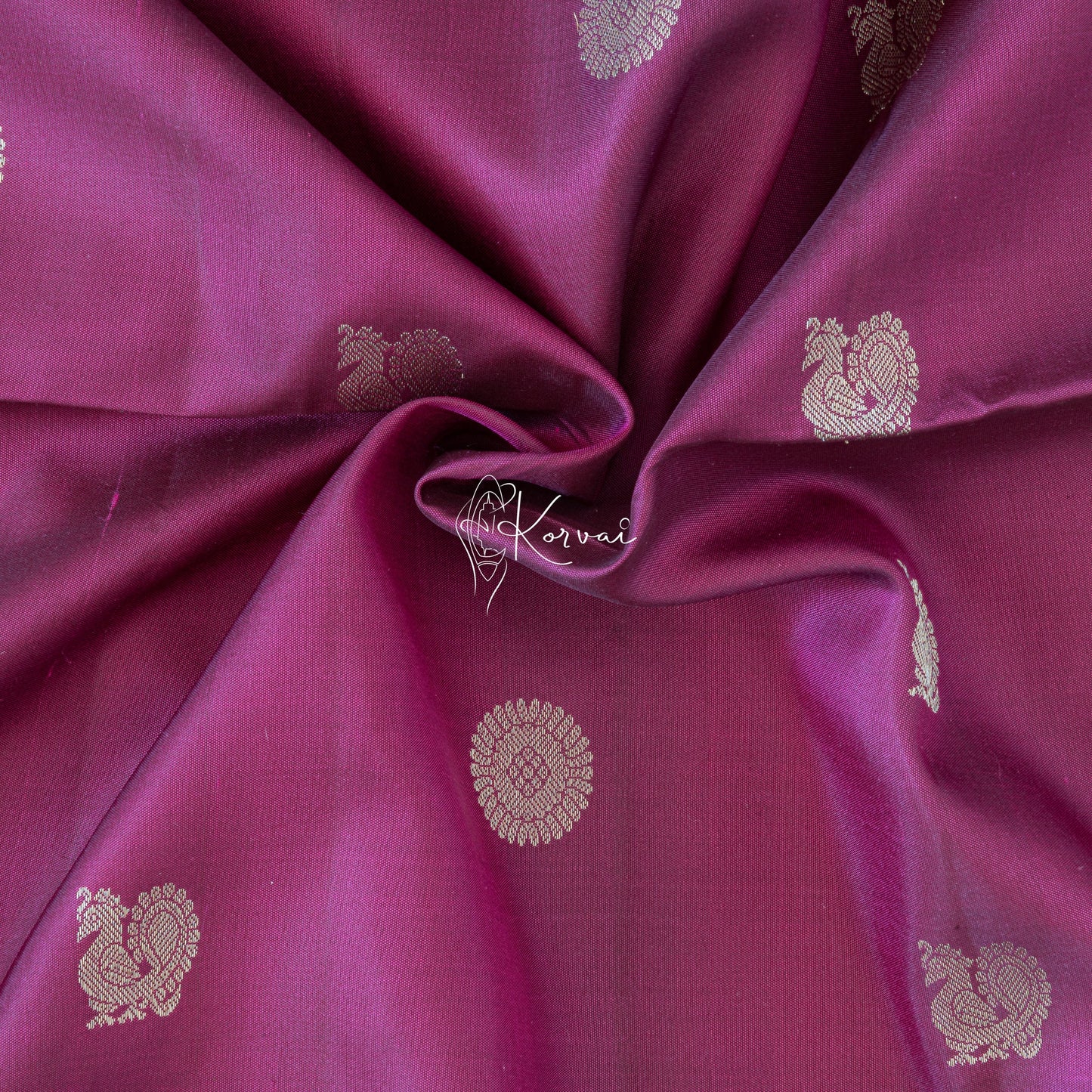 Closer view of the body with gold traditional mayil chakaram motifs.