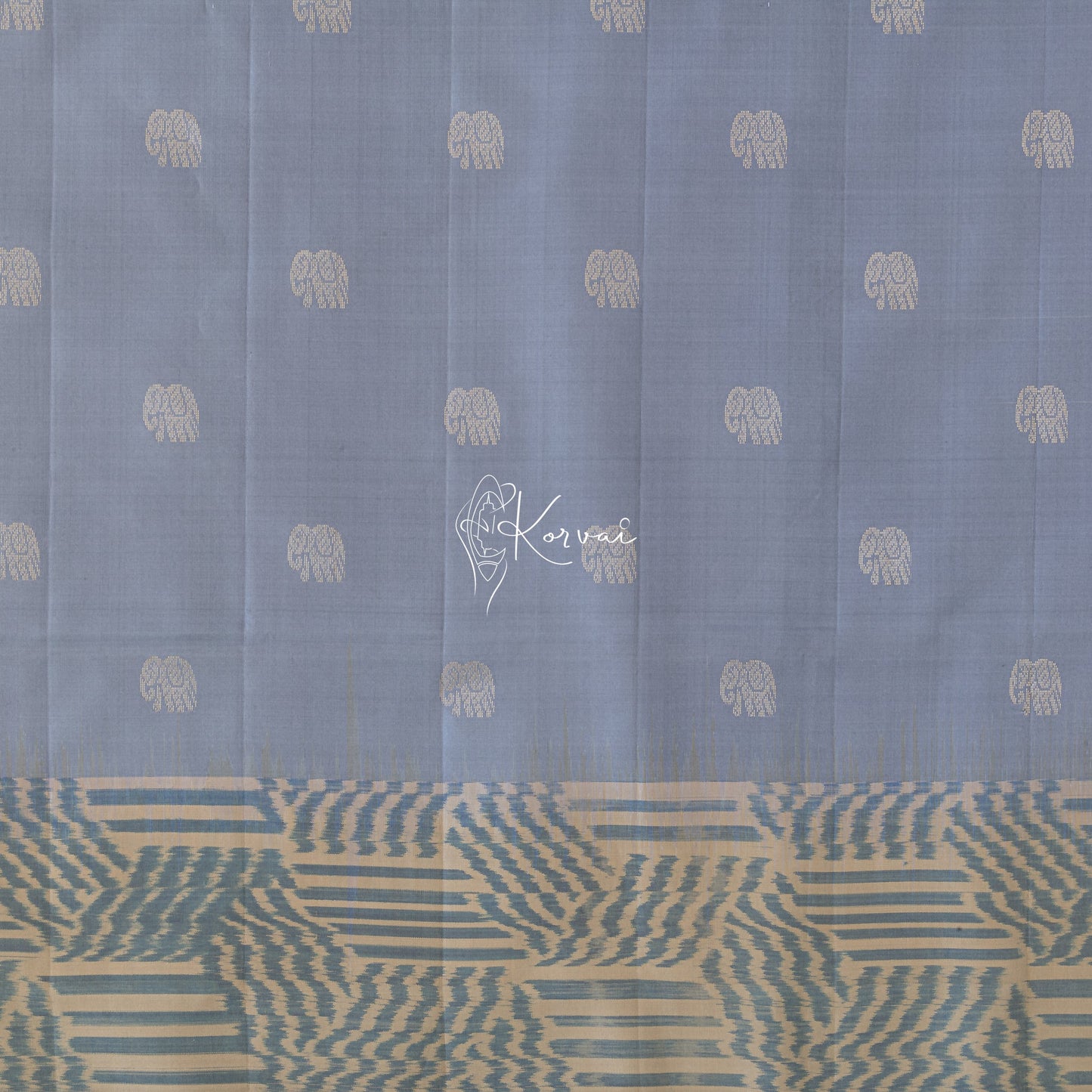 Closer view of the body with elephant motifs in the body and pochampally motifs in the border.
