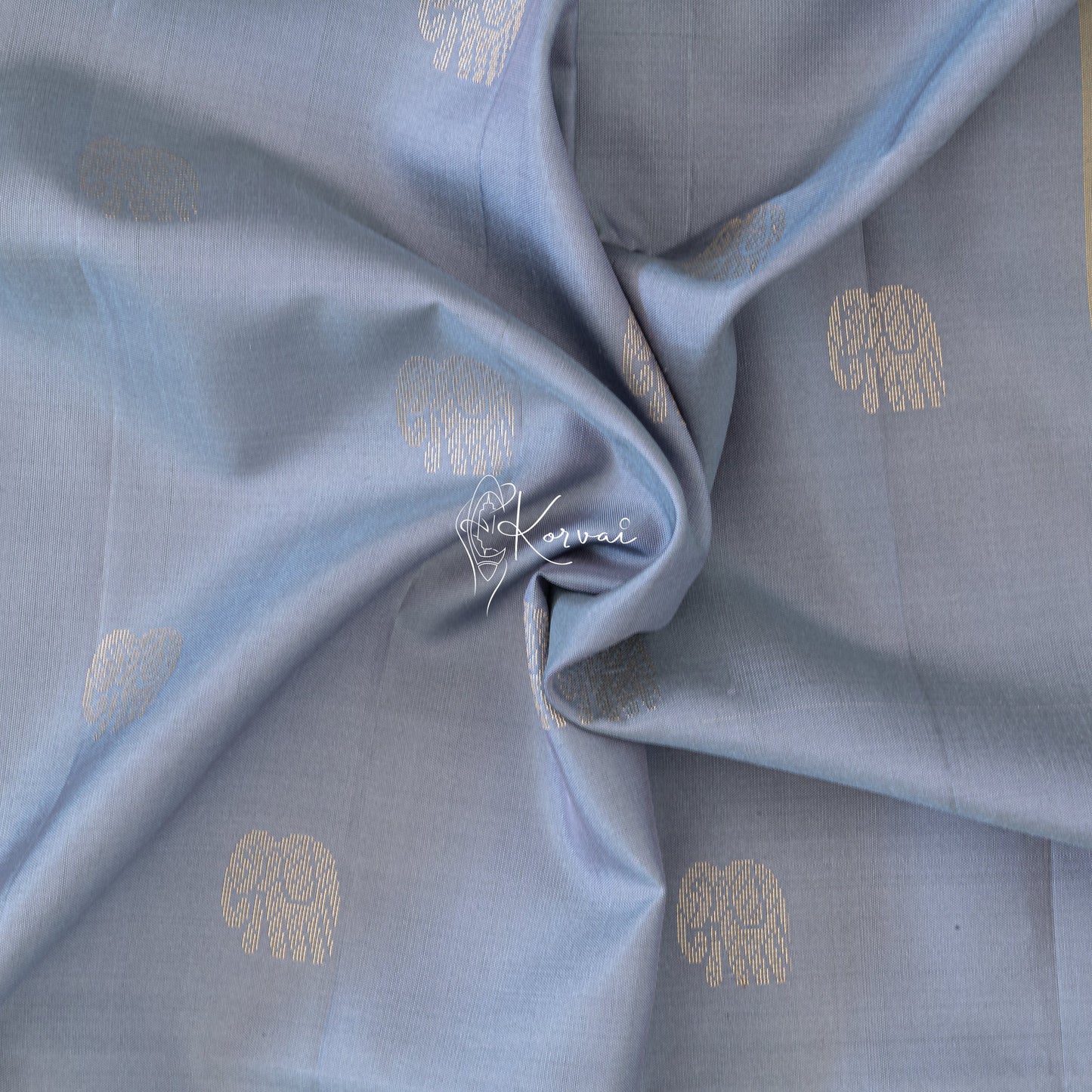 Closer view of the body with gold tiny elephant motifs.