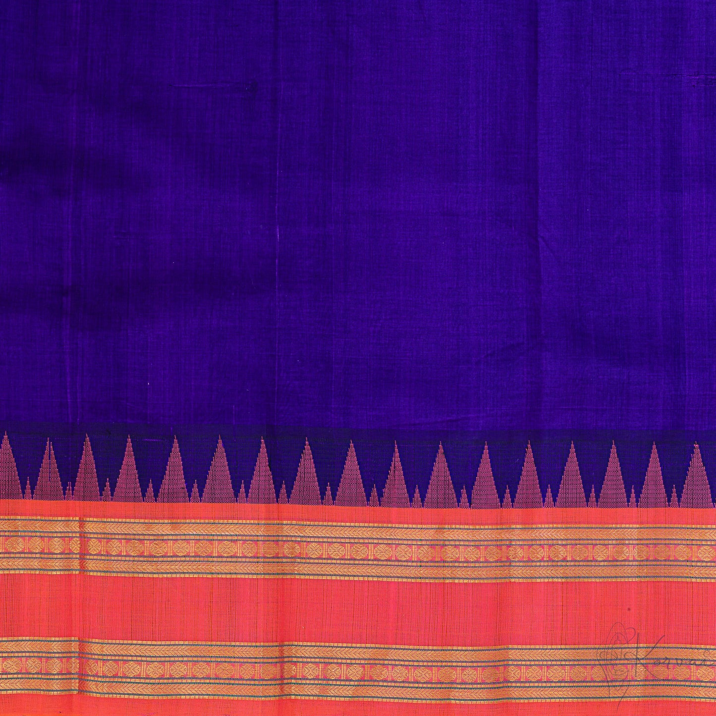 Closer view of blue body with temple korvai border.
