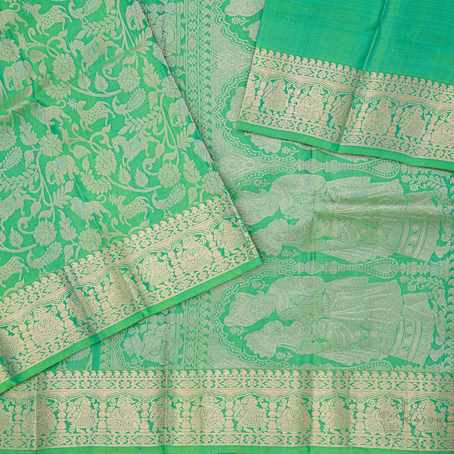 Green Kanjivaram soft silk saree with forest animals and birds motifs through the body and a closer view of Jodha Akbar style pallu.