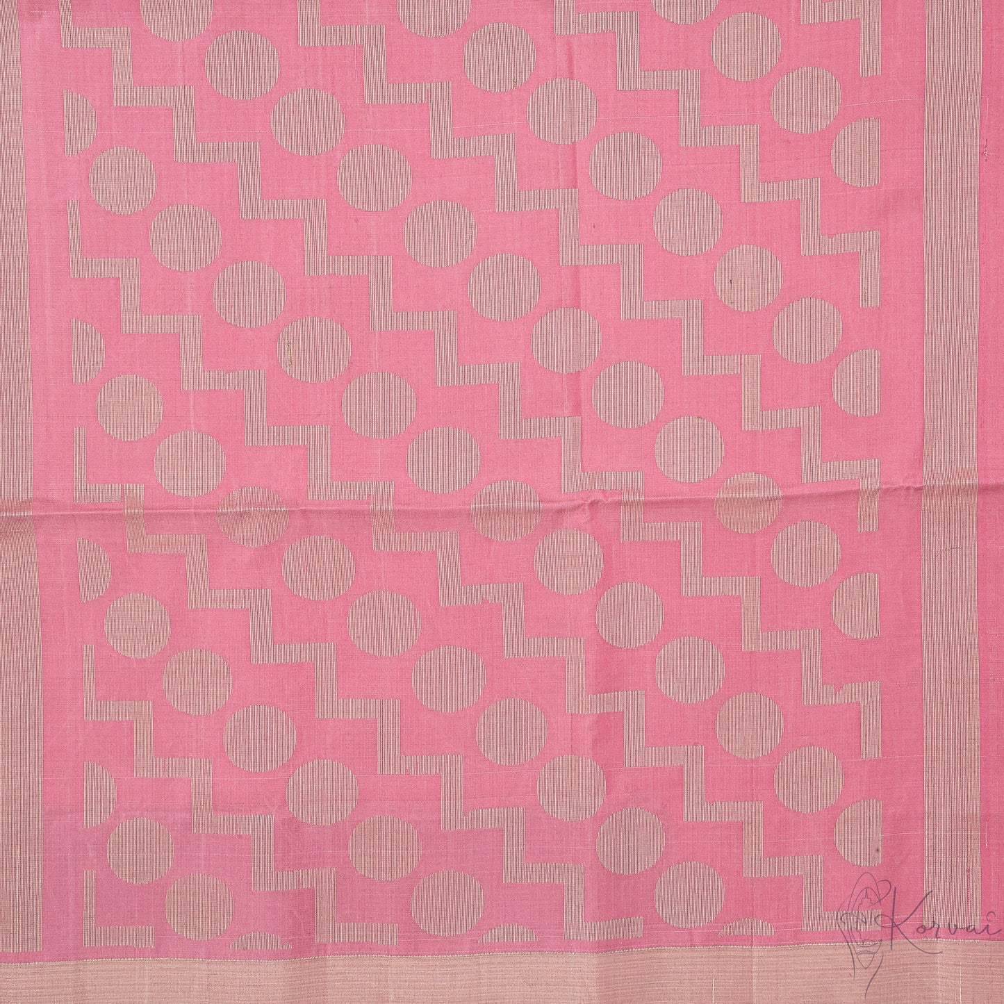 Closer view of the pastel pink pallu with polka dot and geometric design.