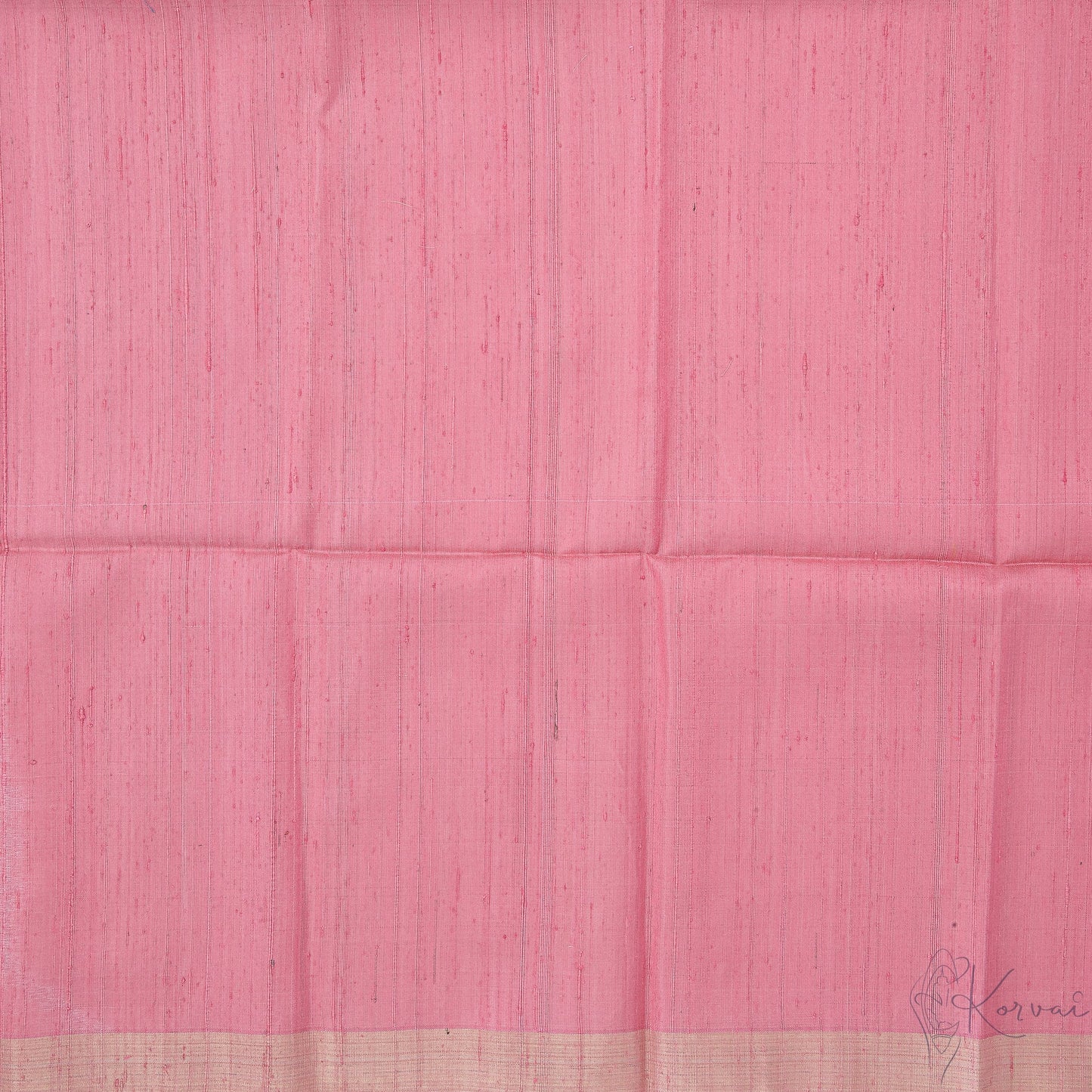 Closer view of pastel pink raw silk blouse with gold border.