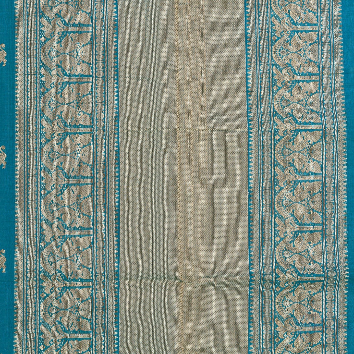 Closer view of blue pallu with intricate gold zari work.