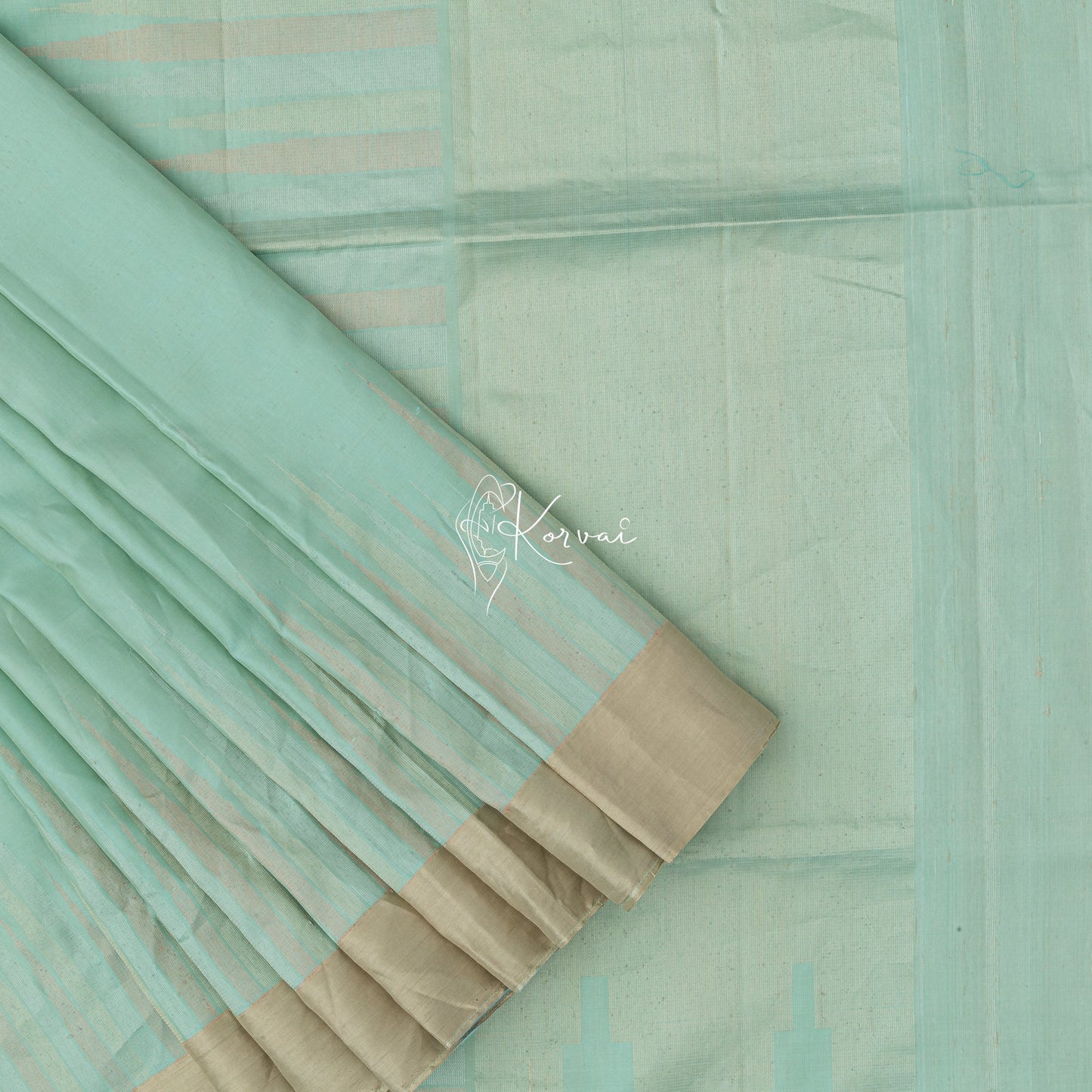 sea blue coloured soft silk saree with traditional mullai moggu motifs in the body.