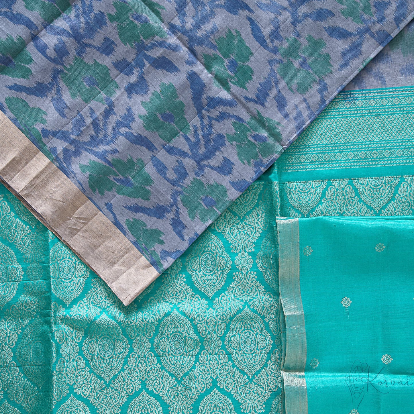 Top view of grey pochampally saree with a closer view of teal pallu with intricate gold design.