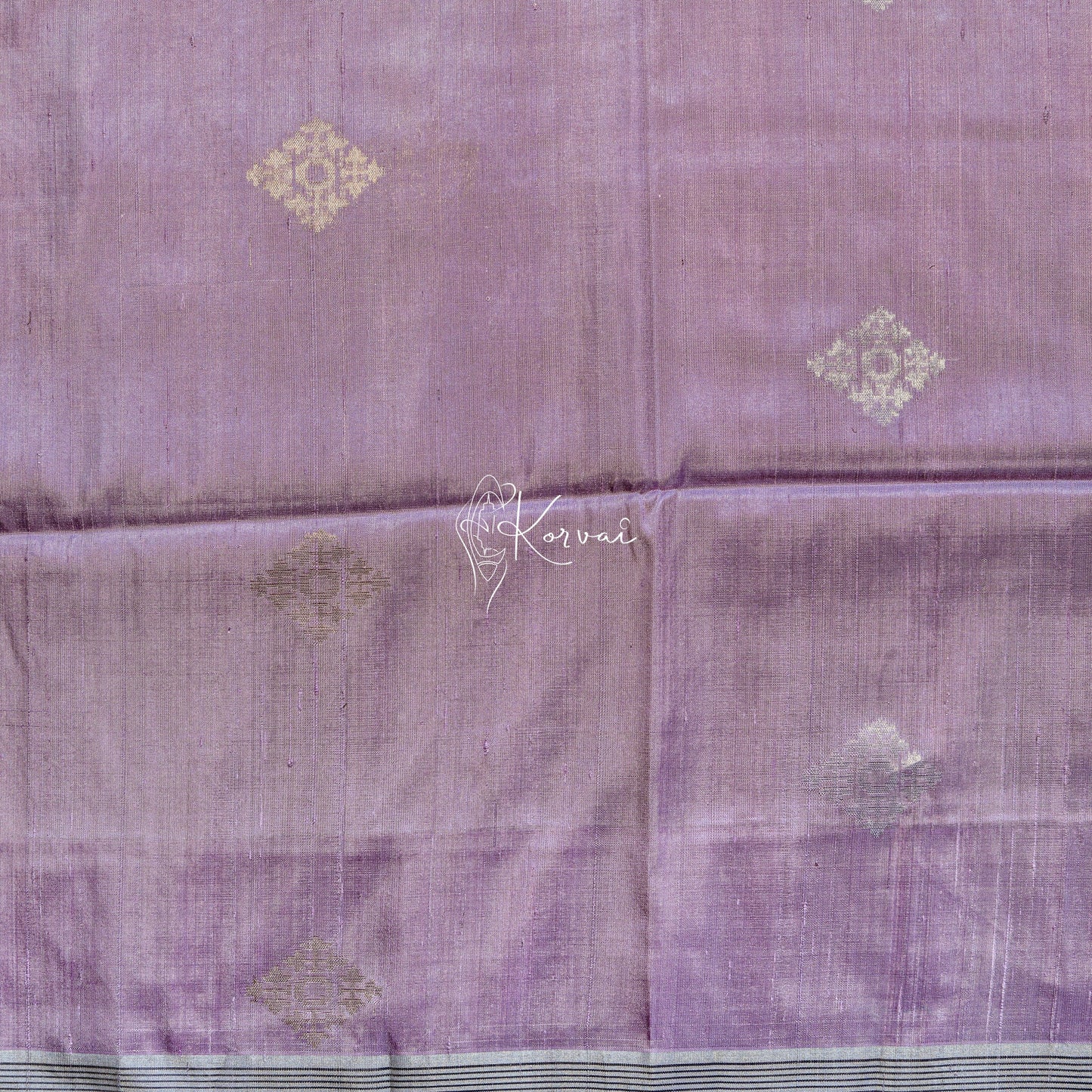 Closer view of the body with geometric motifs.