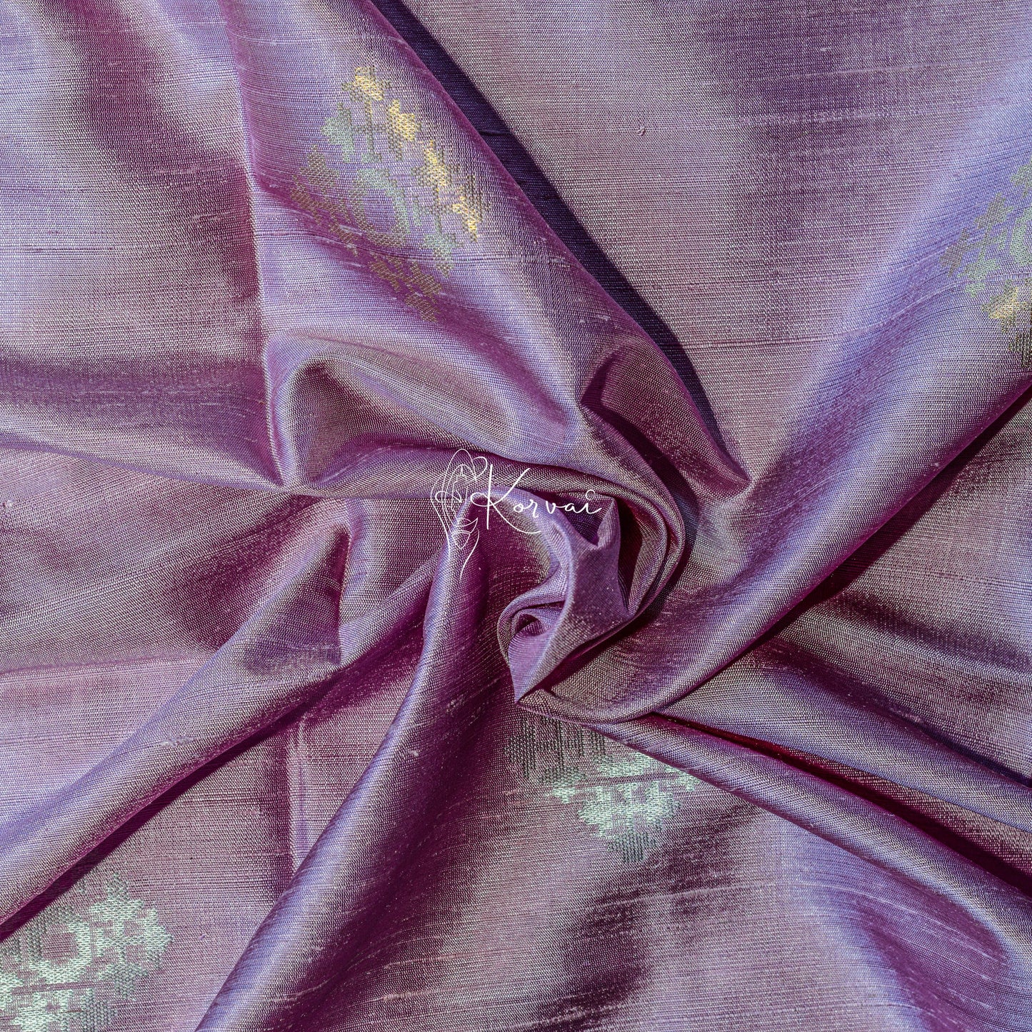 Closer view of the body with geometric motifs.
