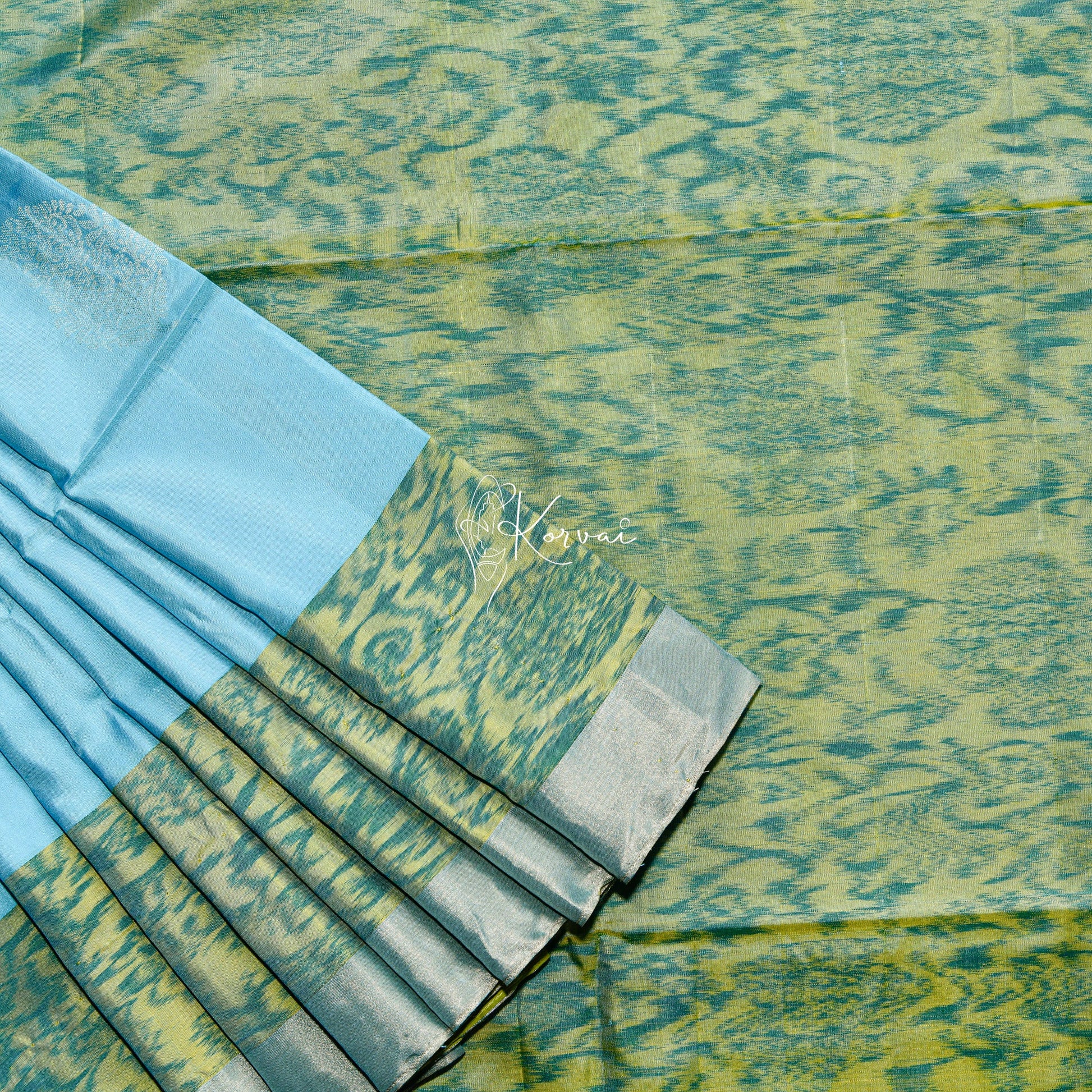 Sky blue coloured soft silk saree with Pochampally prints in the pallu.