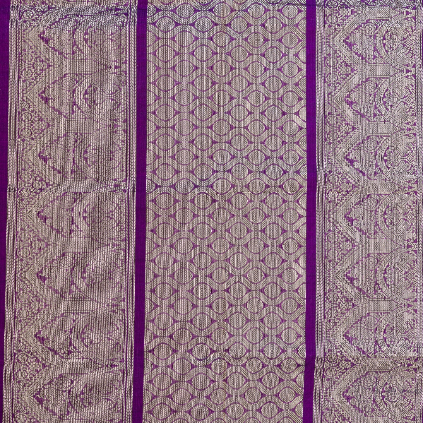 Closer view of violet pallu with intricate gold zari work.