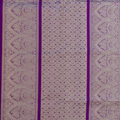 Closer view of violet pallu with intricate gold zari work.