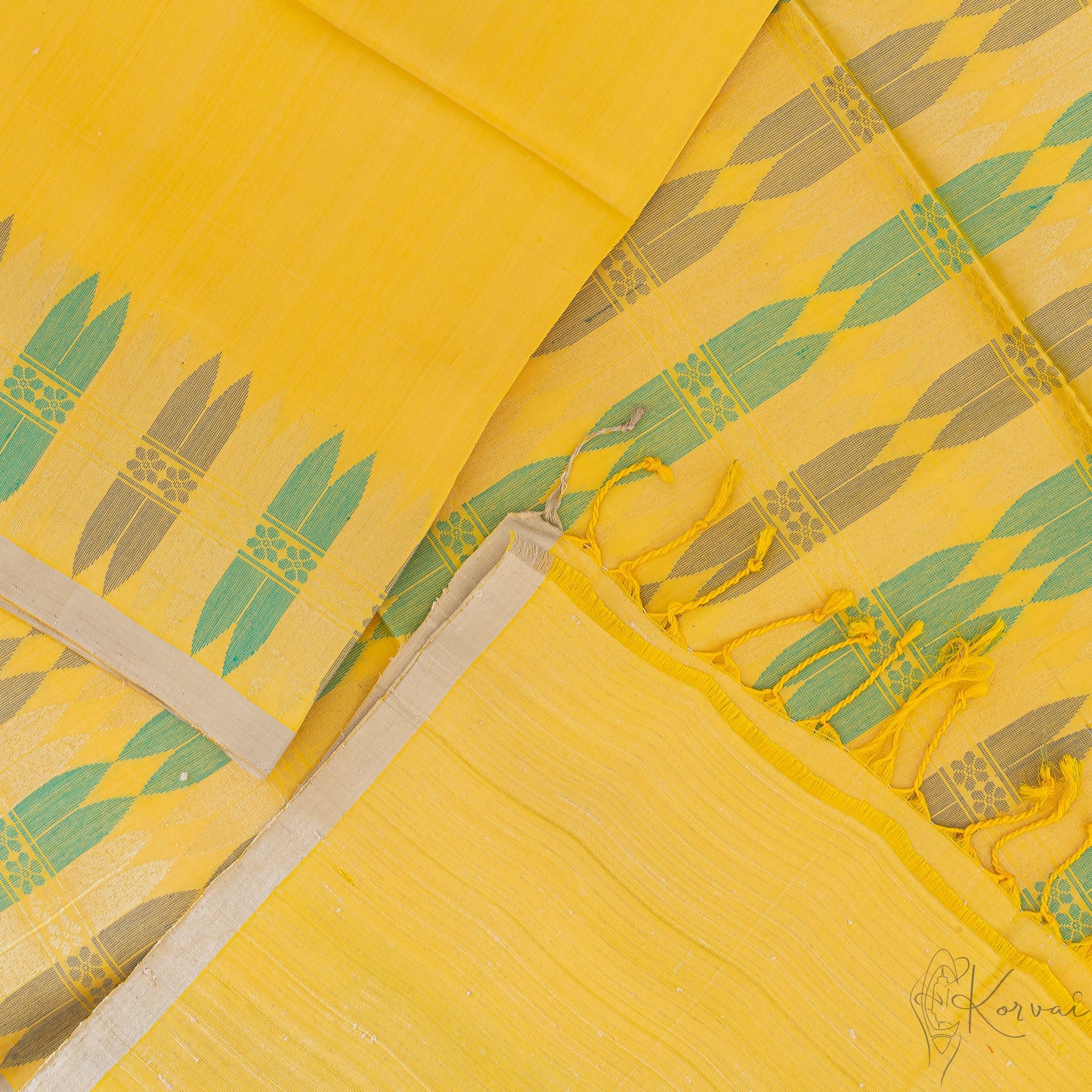 Top view of the yellow Kanjivaram soft silk saree displaying the beauty of pallu with the contemporary design.