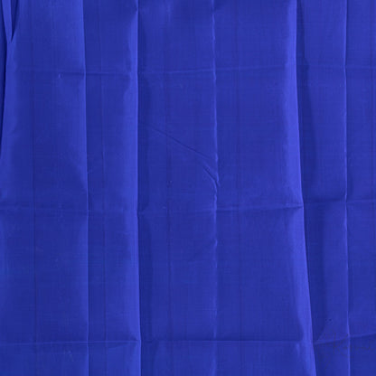 Closer view of plain blue blouse fabric.