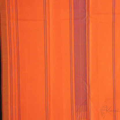 Closer view of orange pallu with blue stripes.