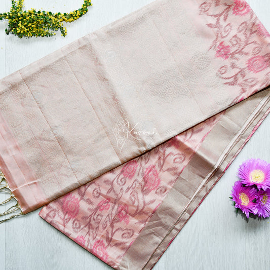 Top view of dusty pink soft silk saree with Pochampally prints.