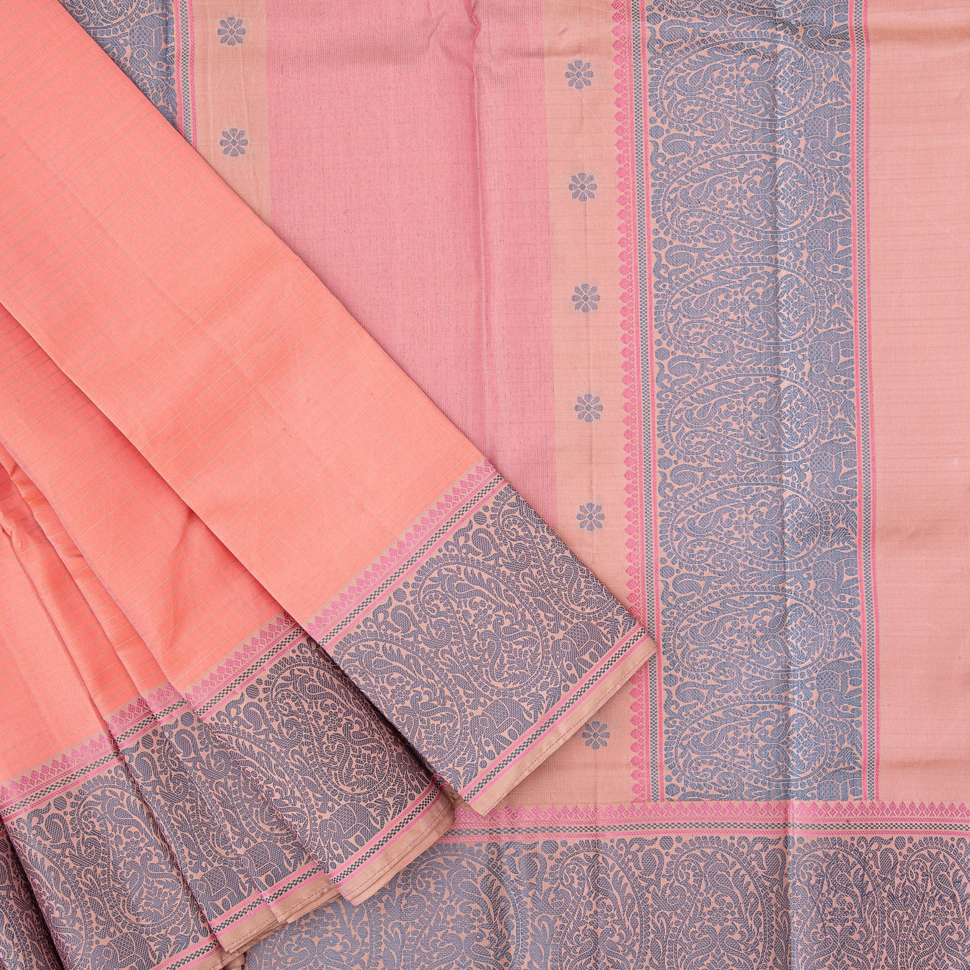 Top view of peach Kanjivaram soft silk saree with cream horizonal stripes and pallu displaying paisley motifs.