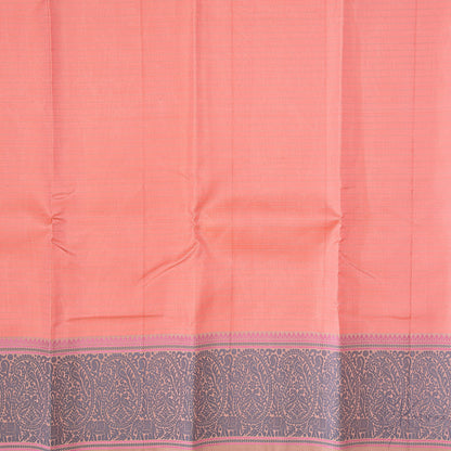 Closer view of the peach coloured body of the saree with cream stripes running horizontally and grey paisley motifs in the border.