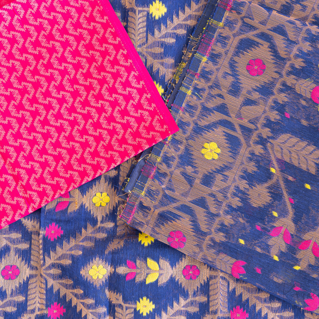 Picture of a navy blue jamdani muslin saree with copper, pink and yellow coloured jamdani embroidery work along with hot pink blouse fabric.