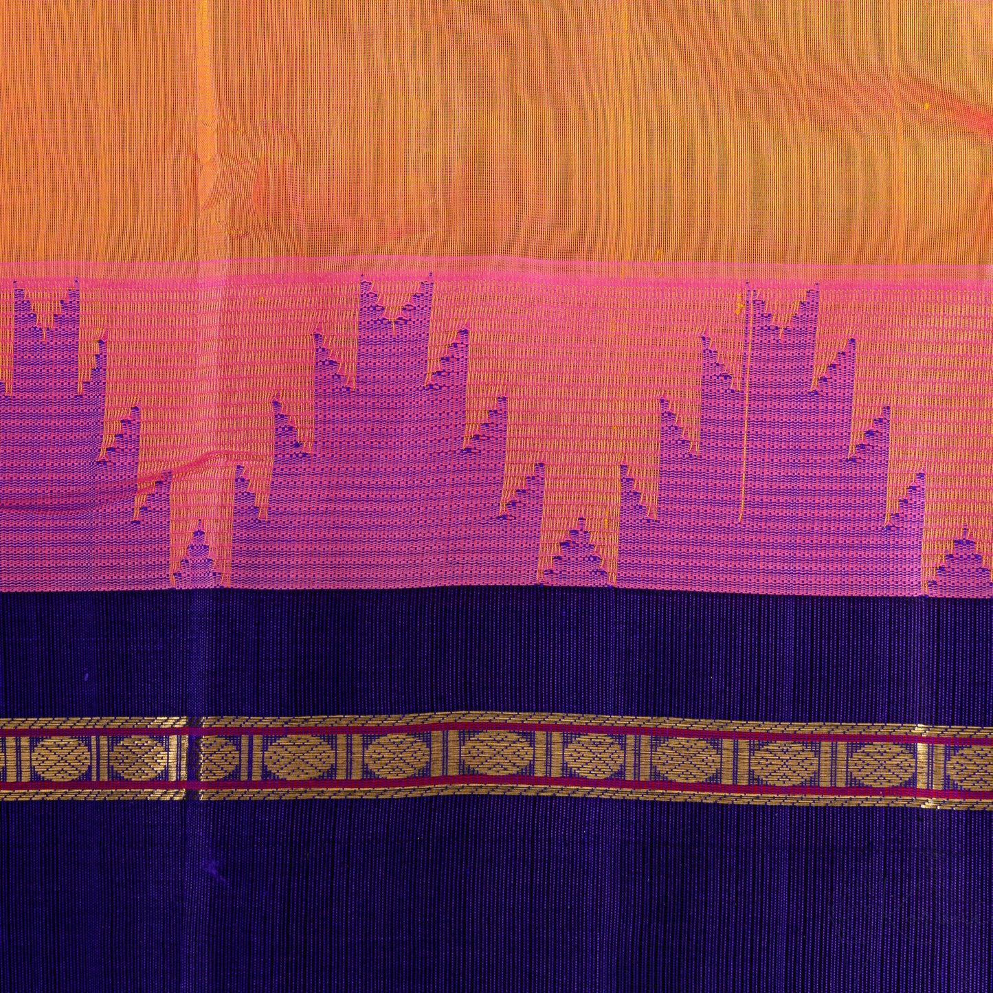 Closer view of pink korvai border with temple motifs.