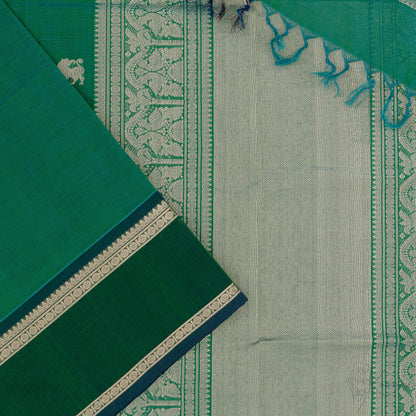 Bottle green silk cotton saree with closer view of Bottle green pallu that has intricate gold zari work.