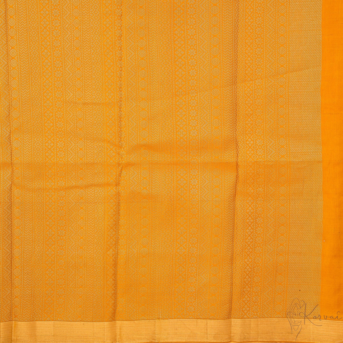 Closer view of the mustard pallu with intricate designs.