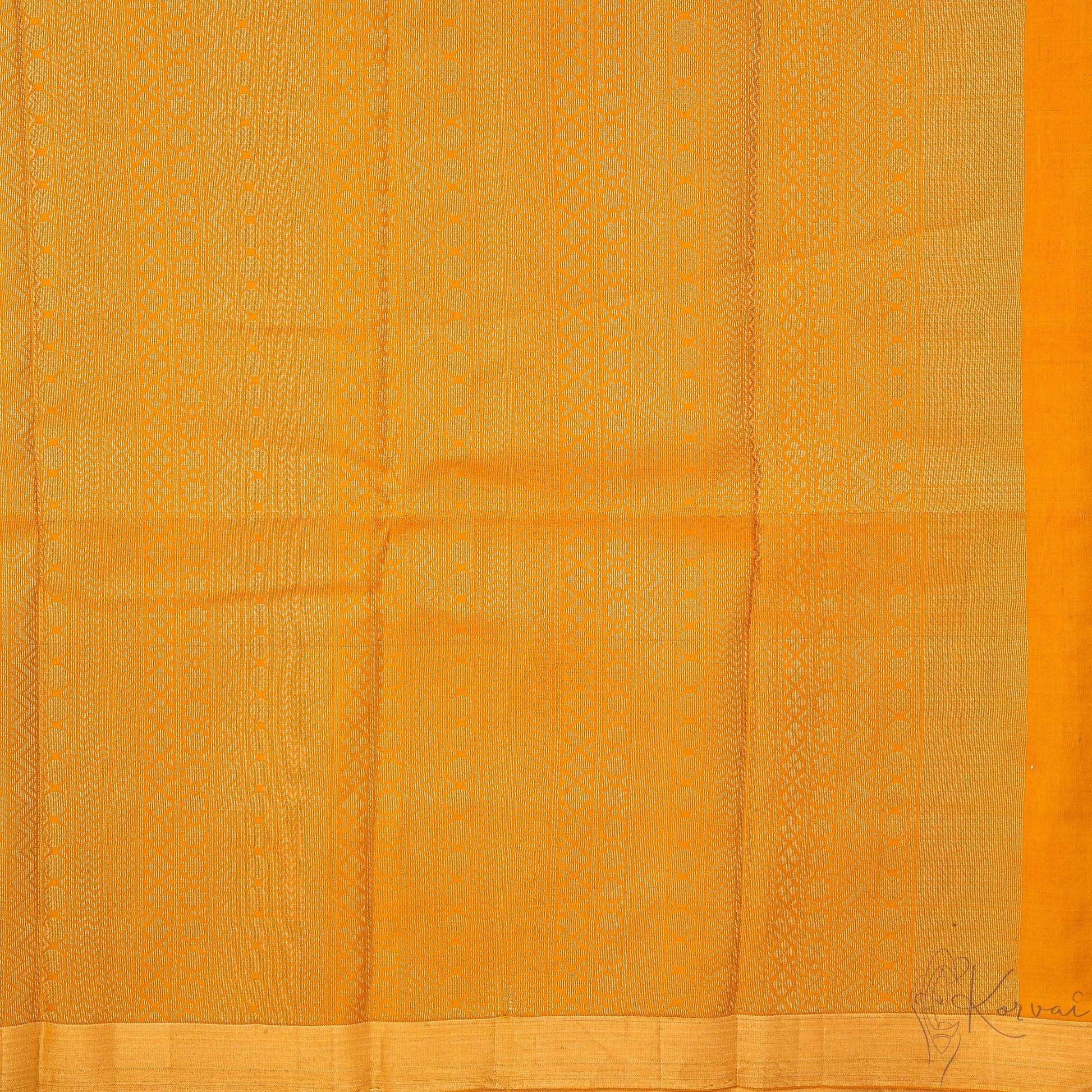 Closer view of the mustard pallu with intricate designs.